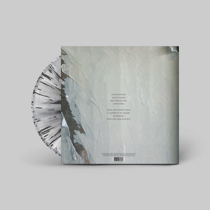 Paradise Now: Crystal Clear w/ Black & White Splatter Vinyl LP { vinyl }