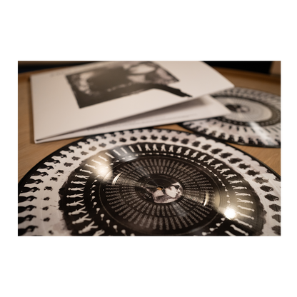 Currency Of Man - 10 Year Anniversary (Zoetrope Vinyl) { vinyl }