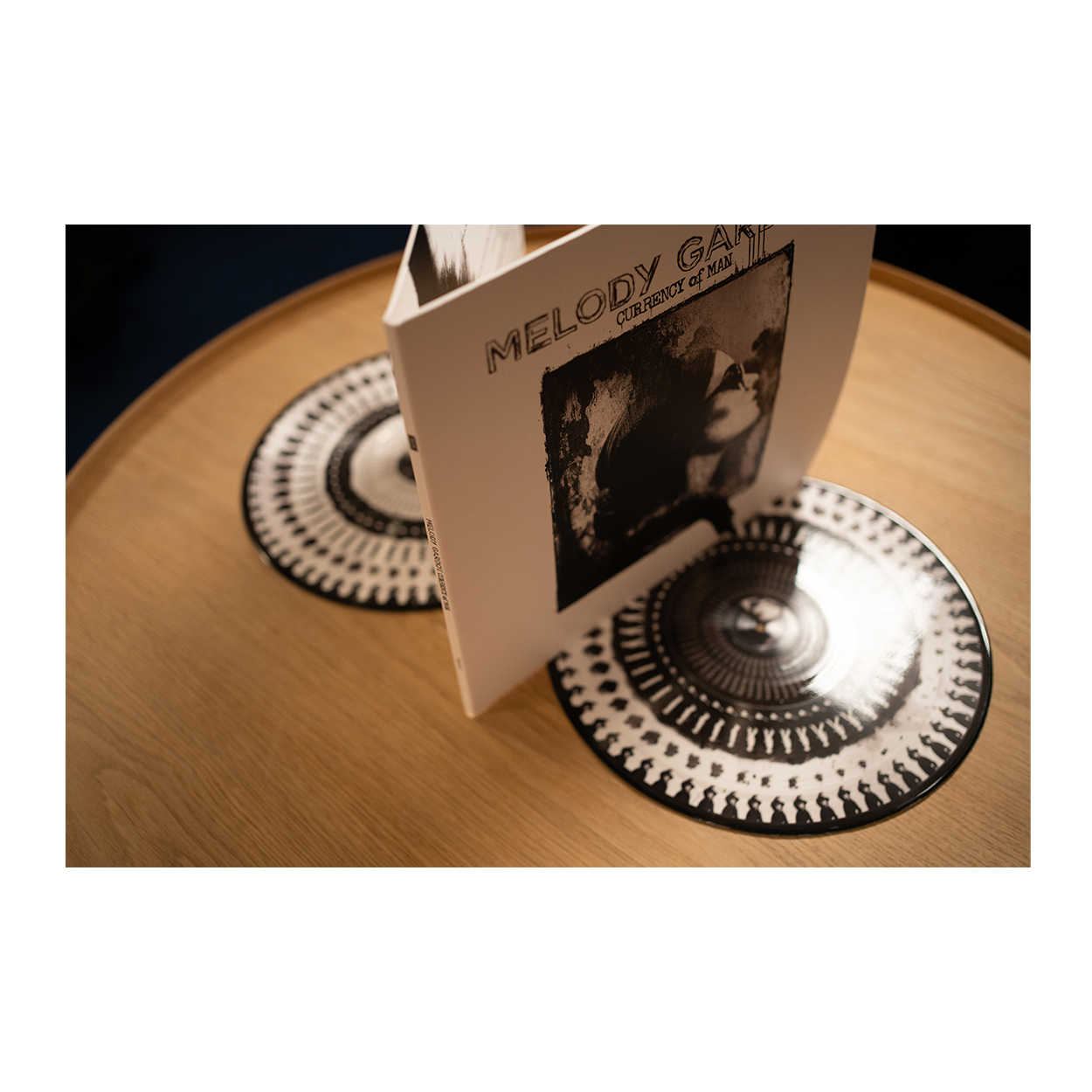 Currency Of Man - 10 Year Anniversary (Zoetrope Vinyl) { vinyl }