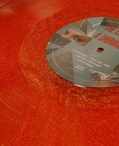 The Life of a Showgirl: Sweat and Vanilla Perfume Portofino Orange Glitter Vinyl { vinyl }